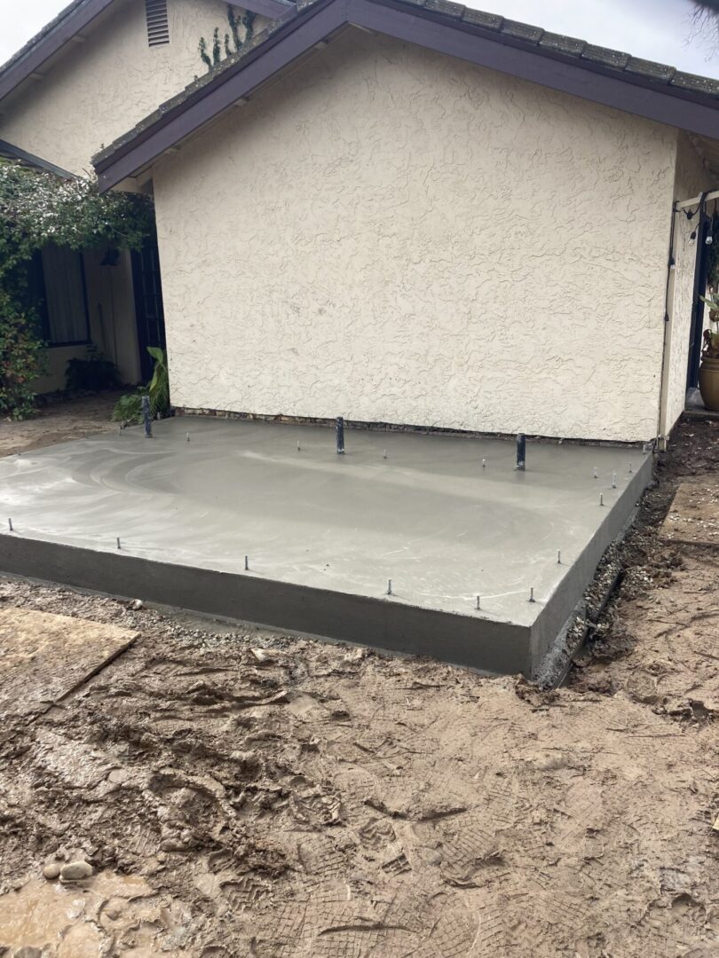A concrete slab sitting in the middle of a house.